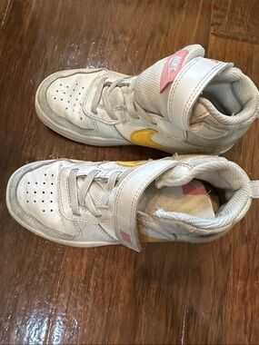 Nike Kids White Sneakers with Yellow Swoosh and Pink Tab